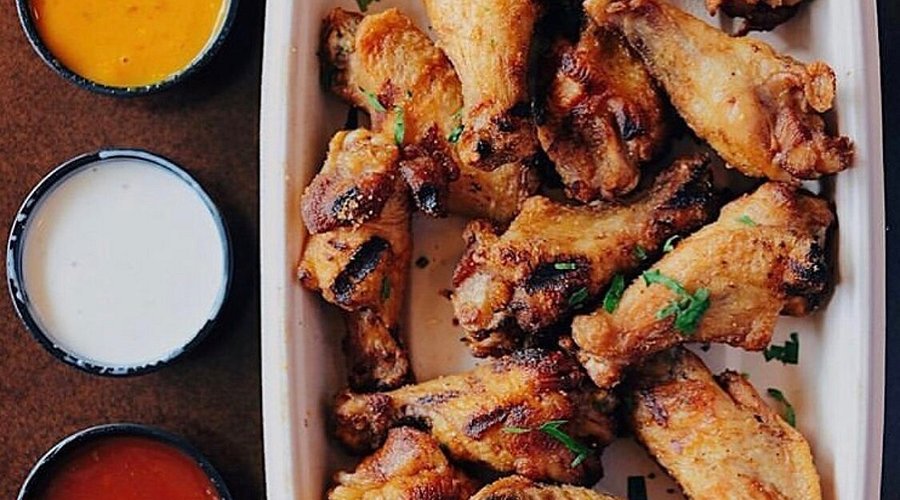 Local Expedition Wood Fired Grill signature dishes Pulled PorkChicken WingsGrilled Chicken